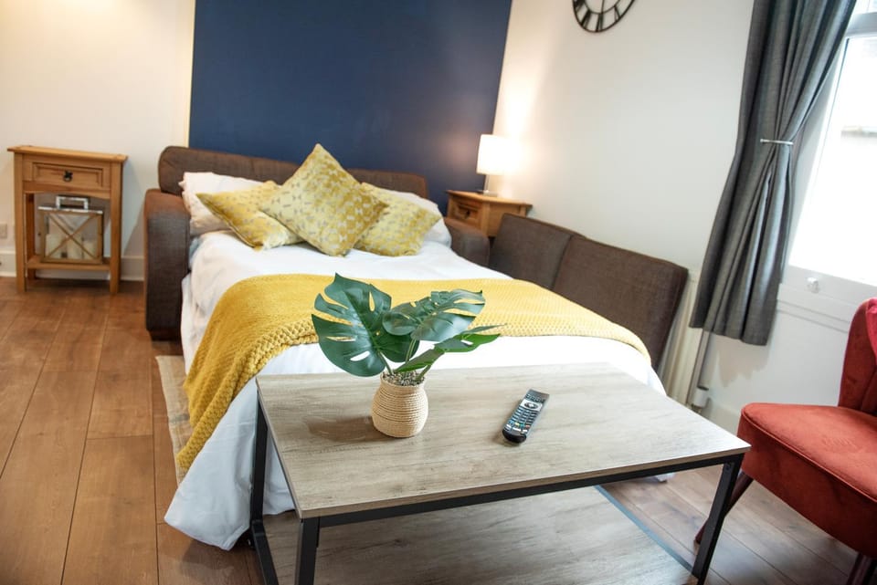 Bed, Living room, Seating area