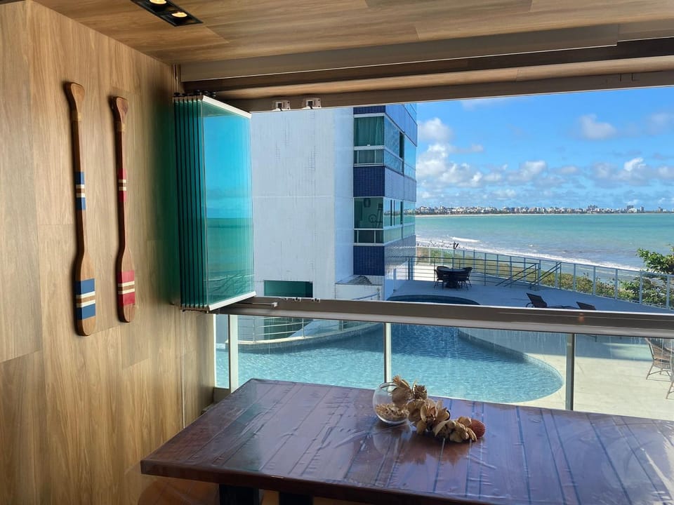 Day, View (from property/room), Dining area, Pool view, Sea view, Swimming pool