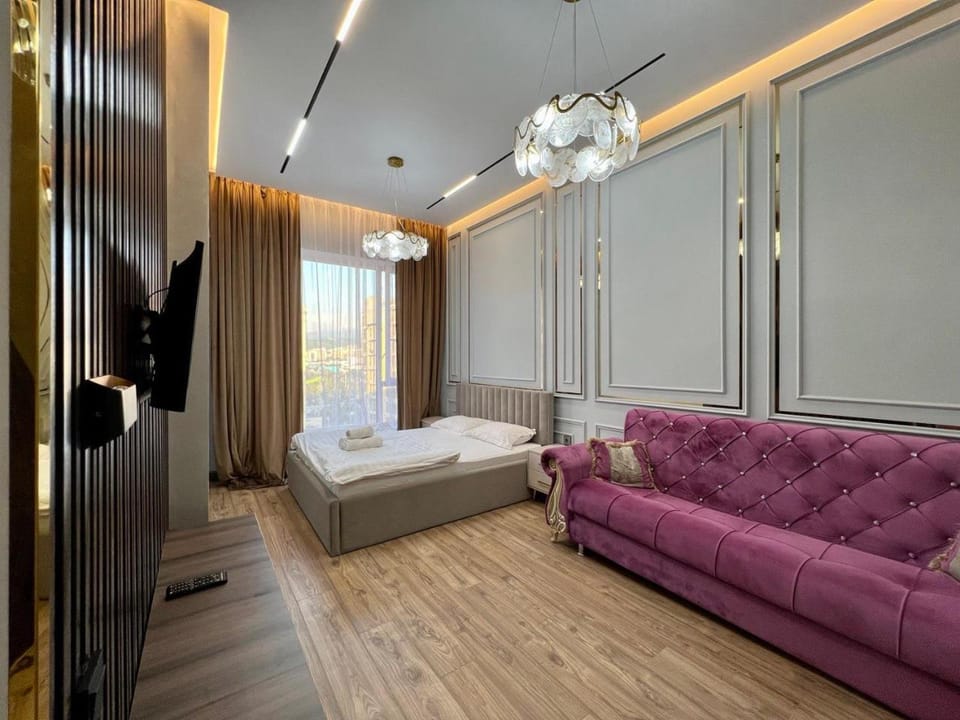 Bed, TV and multimedia, Seating area, towels