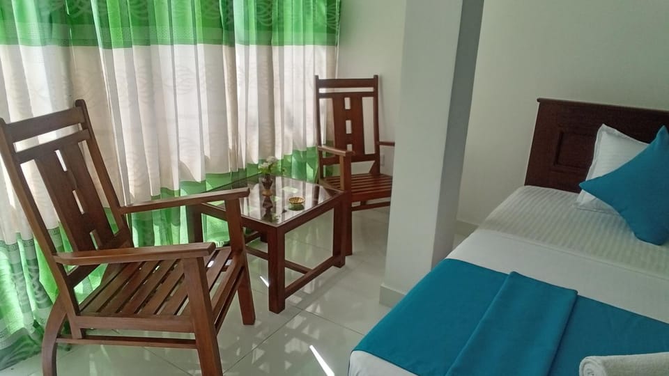 Bed, Seating area, Bedroom