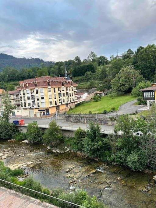 Property building, Nearby landmark, Natural landscape, Mountain view, River view