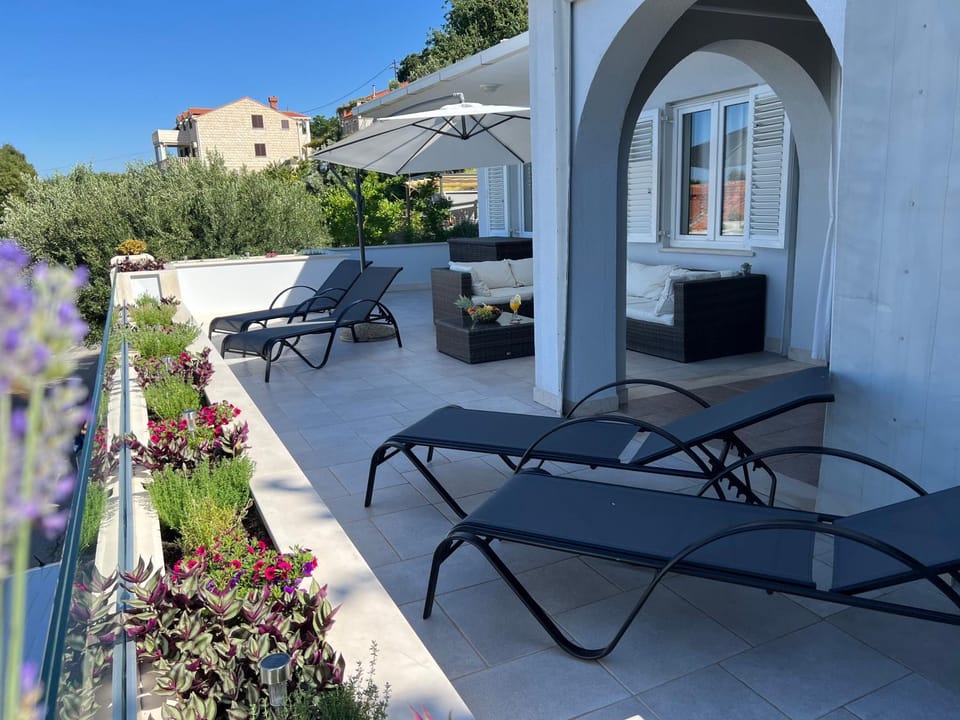 Property building, Patio, Day, View (from property/room), Balcony/Terrace, Seating area, sunbed