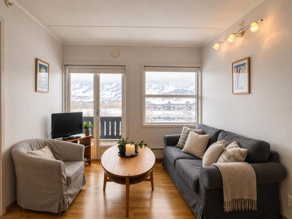 TV and multimedia, Living room, Seating area, Lake view, Mountain view