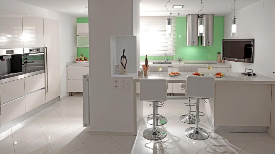 Kitchen or kitchenette, dishwasher, oven, stove, toaster