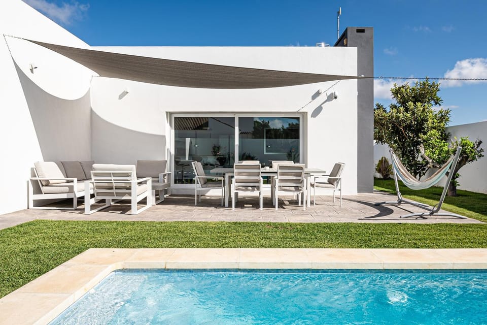 Property building, Living room, Swimming pool
