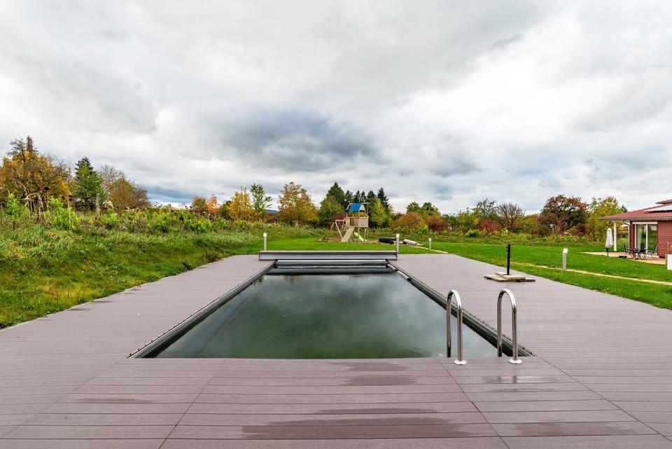 Property building, Living room, Swimming pool
