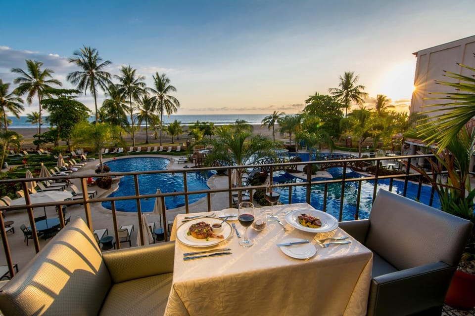 Restaurant/places to eat, Balcony/Terrace, Pool view, Sunset