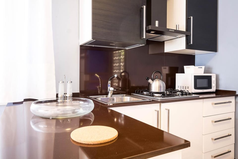 Kitchen or kitchenette, stove