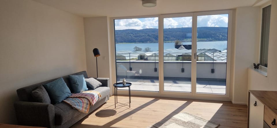 Natural landscape, View (from property/room), Balcony/Terrace, Living room, Seating area, Lake view