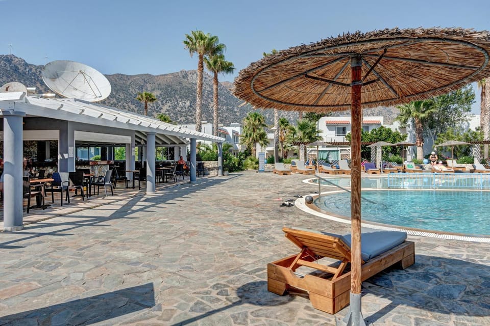 Property building, Living room, Swimming pool