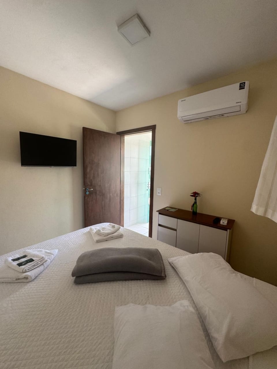 Bed, Photo of the whole room, Bedroom, towels, air conditioner