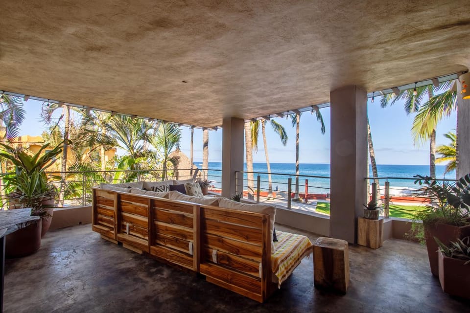 Day, View (from property/room), Living room, Seating area, Garden view, Pool view, Sea view