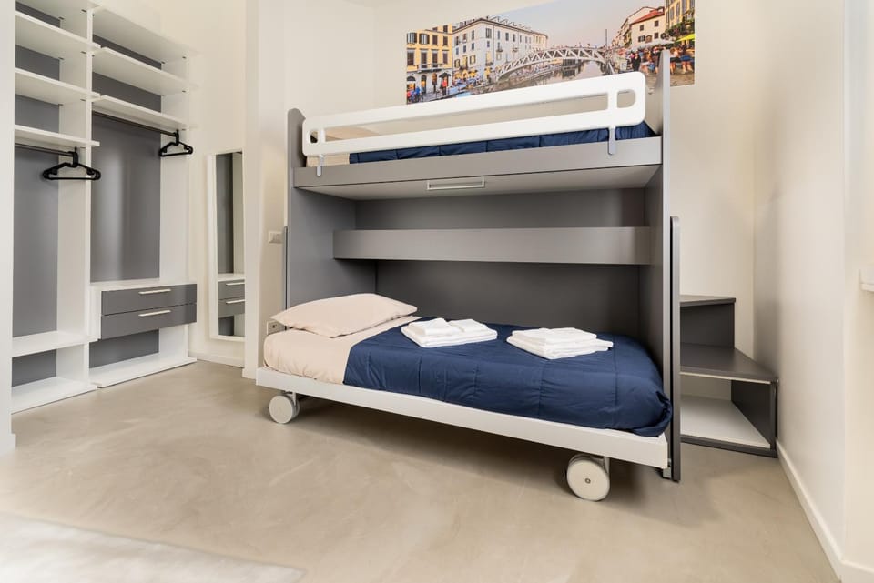 bunk bed, towels, wardrobe