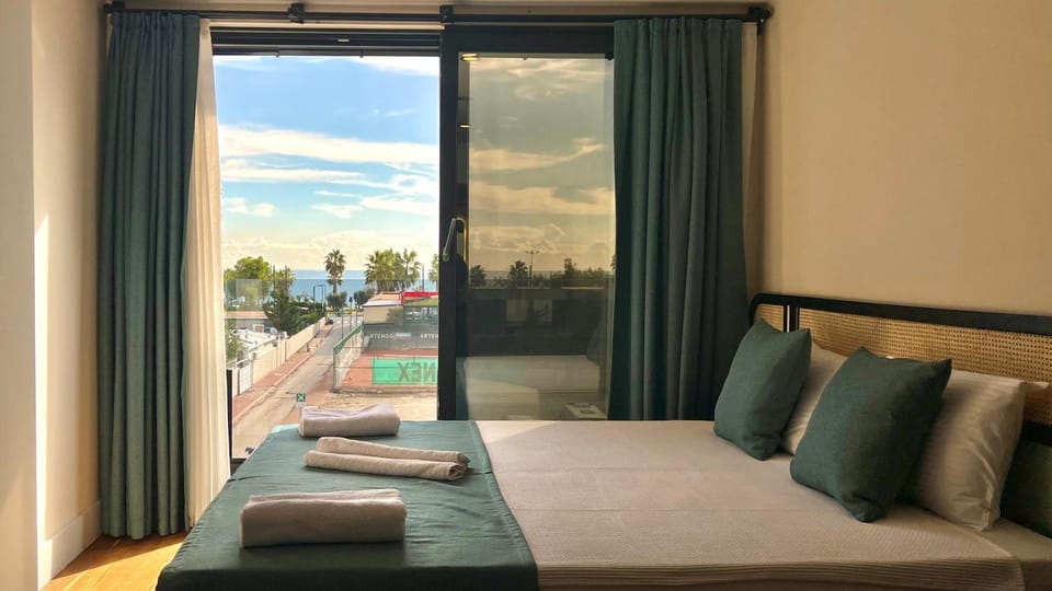 Patio, Bed, Day, View (from property/room), Balcony/Terrace, Living room, Photo of the whole room, Seating area, Beach, Beach, Bedroom, Sea view, sunbed, towels