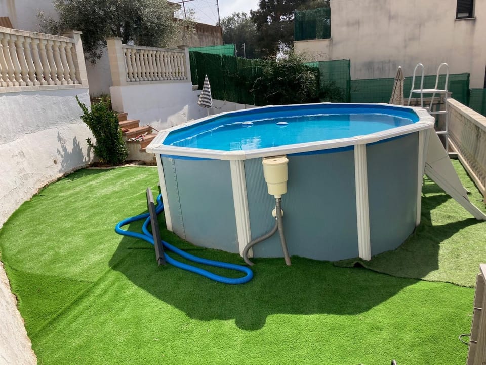 Property building, Living room, Swimming pool