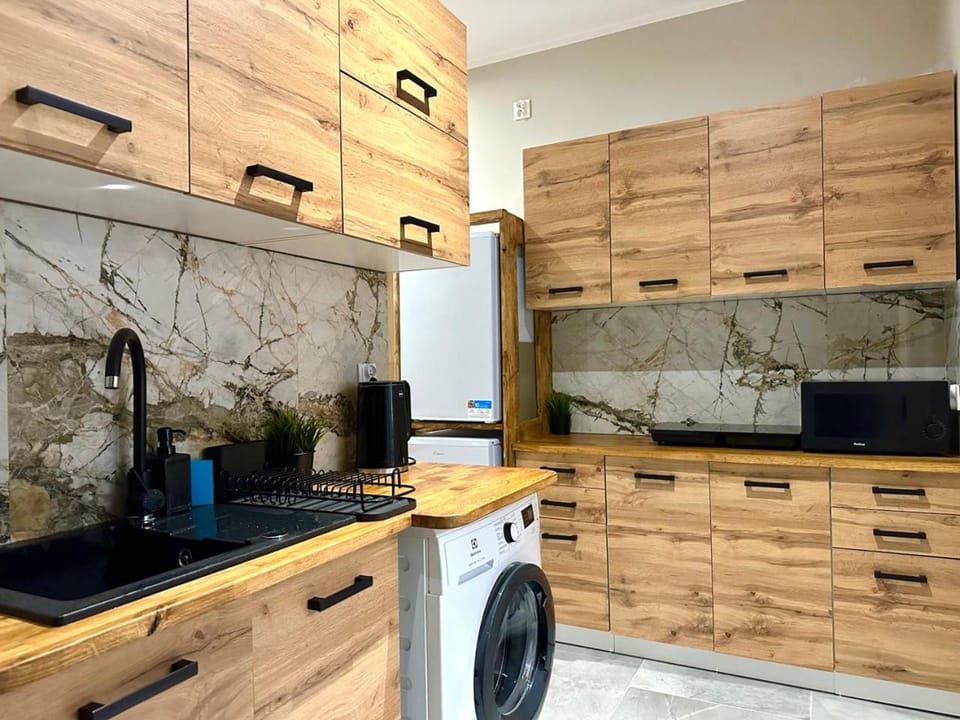 Coffee/tea facilities, Kitchen or kitchenette, minibar, stove, washing machine