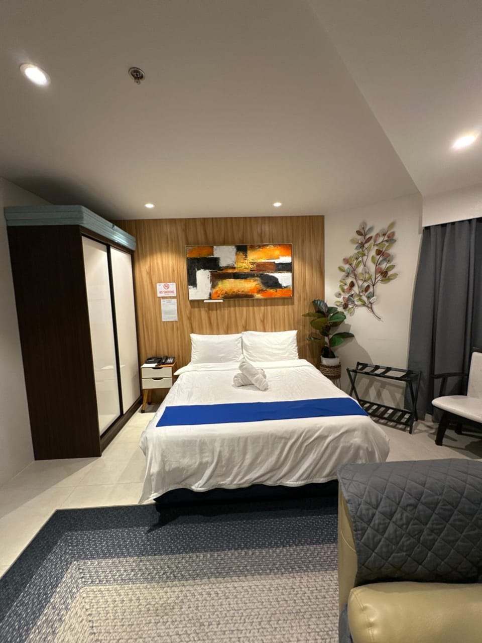 Bed, Living room, Seating area, Bedroom