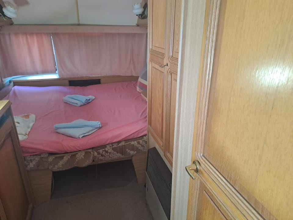Bed, Photo of the whole room, towels, wardrobe