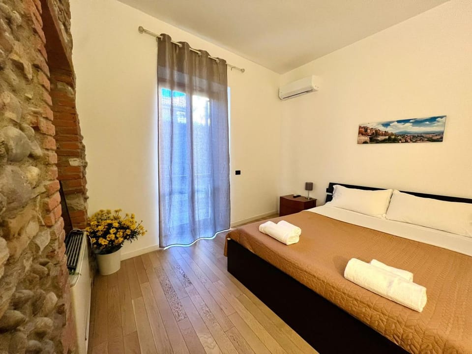 Bed, Photo of the whole room, Bedroom, towels, air conditioner