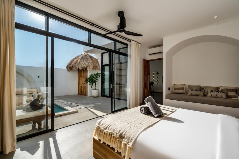 Bed, View (from property/room), Seating area, Bedroom, Pool view, Inner courtyard view, fireplace, towels, air conditioner
