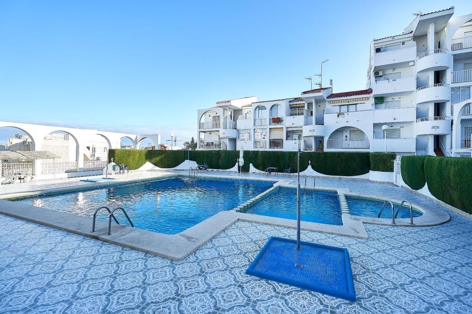 Property building, Pool view, Swimming pool, sunbed