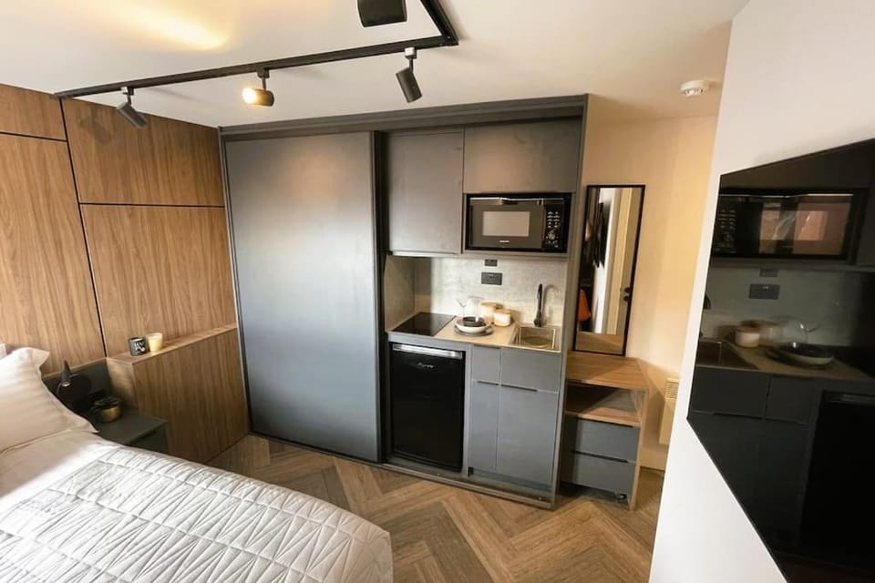 Bed, Kitchen or kitchenette, Bedroom, oven, stove, wardrobe