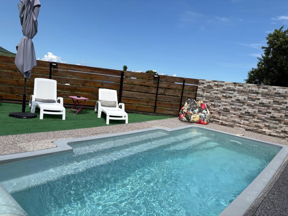 Swimming pool, sunbed