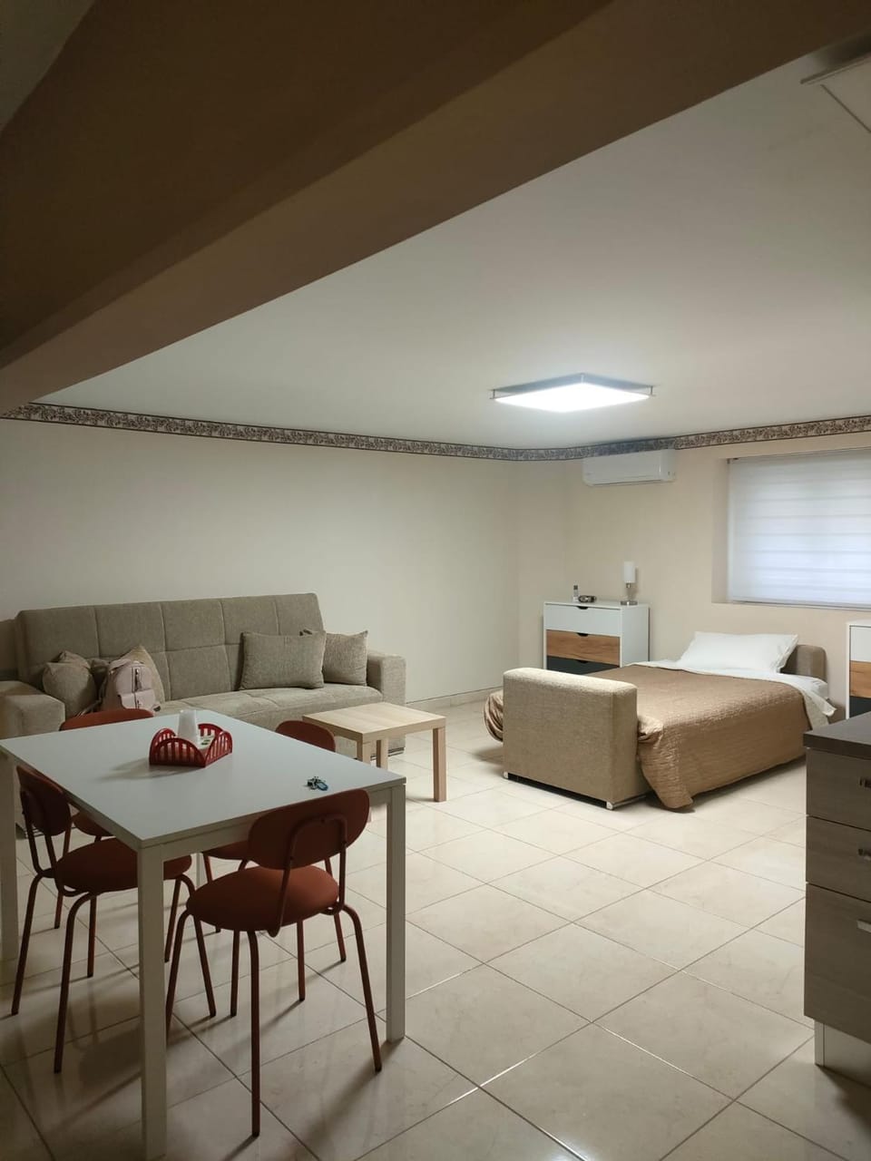 Bed, Living room, Seating area, Dining area