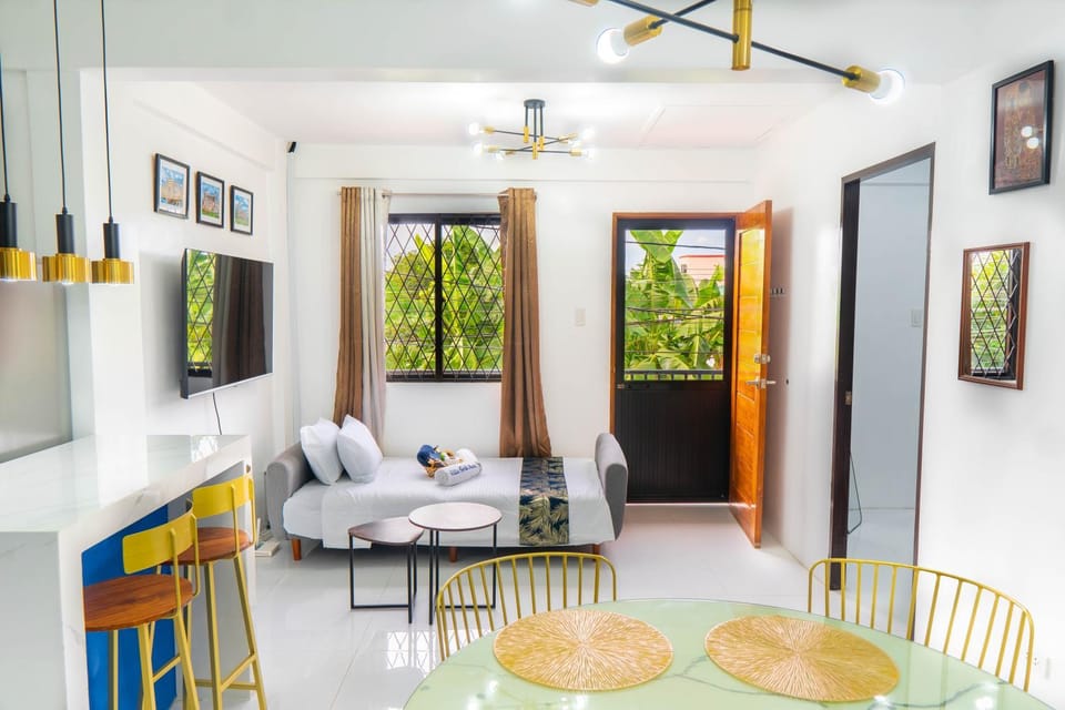 Living room, Seating area, fireplace, air conditioner