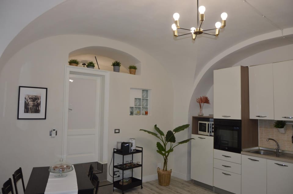 Kitchen or kitchenette, oven, stove