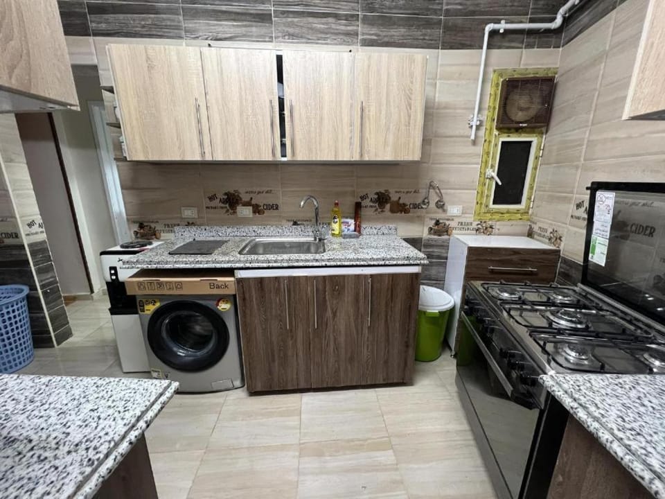 Kitchen or kitchenette, oven, washing machine, kitchen