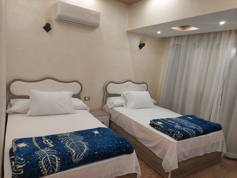 Photo of the whole room, Bedroom, air conditioner