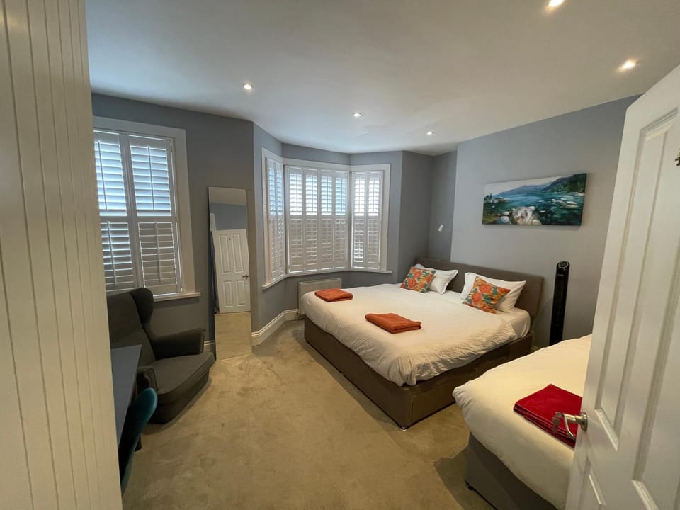 Photo of the whole room, Seating area, Bedroom, towels, wardrobe