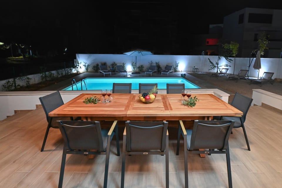Patio, Night, Swimming pool, sunbed