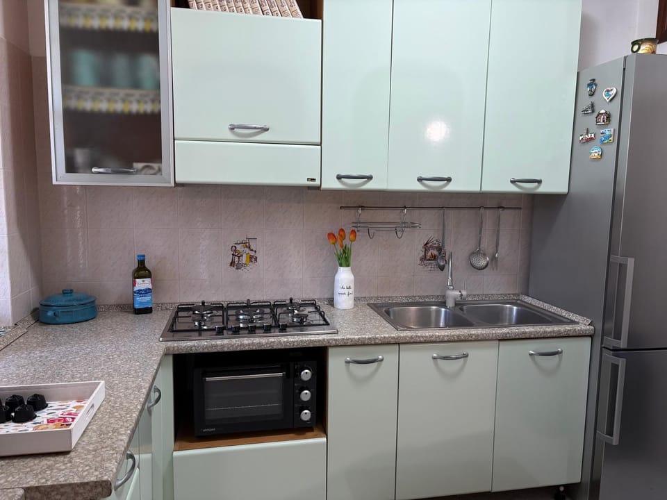 Kitchen or kitchenette, oven, stove