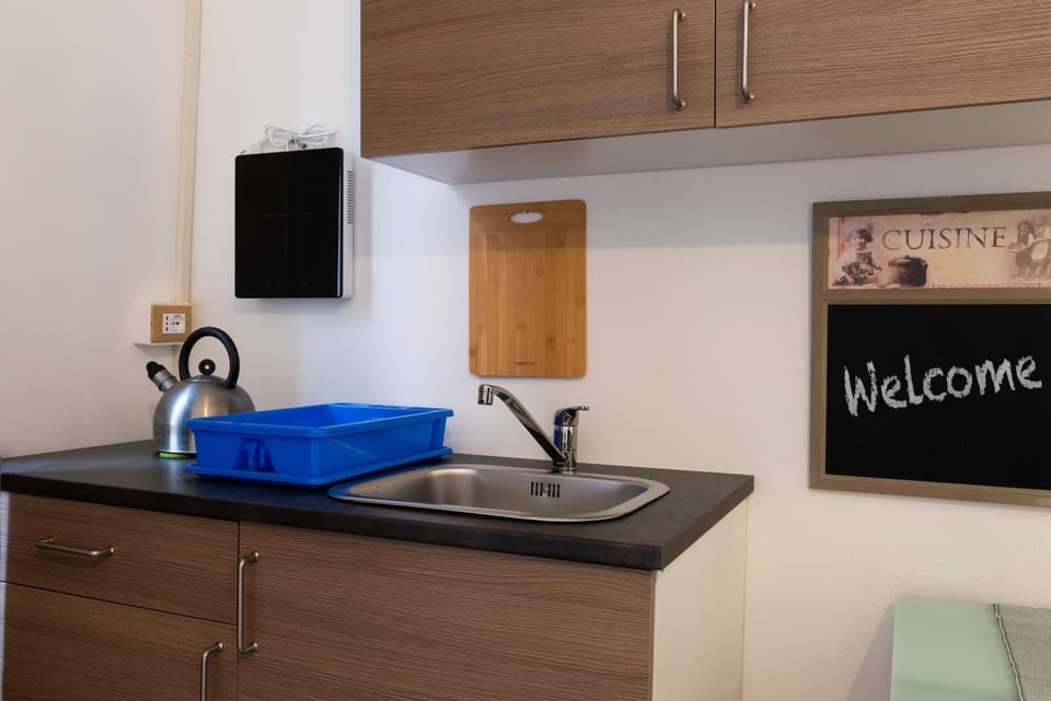 Kitchen or kitchenette, stove