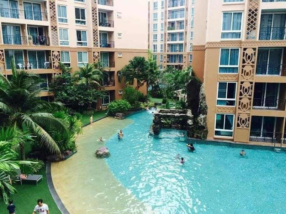 Property building, Communal lounge/ TV room, Spring, Day, Natural landscape, Garden, Aqua park, Evening entertainment, City view, Garden view, Pool view, Swimming pool, sunbed
