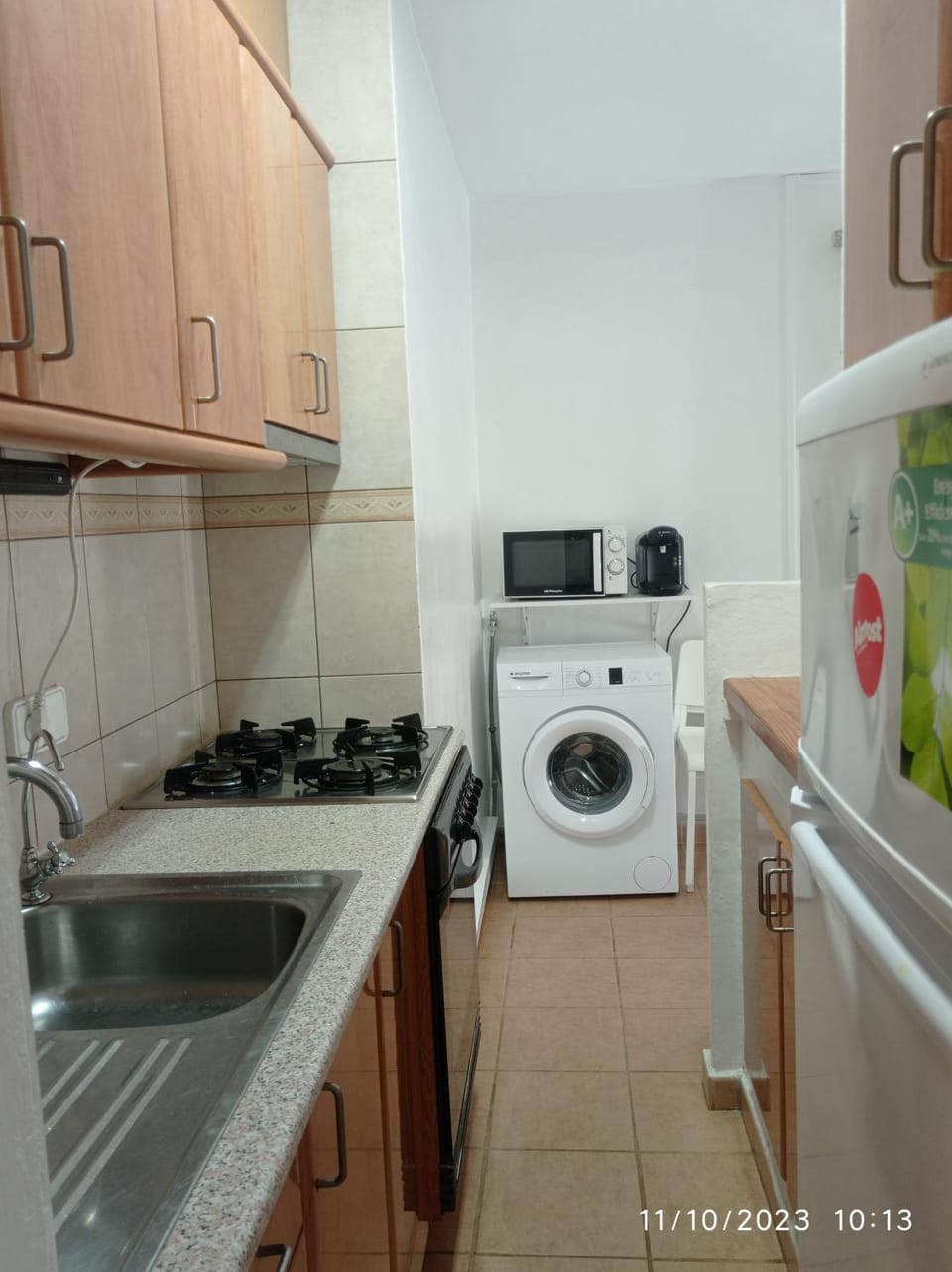 Kitchen or kitchenette, washing machine