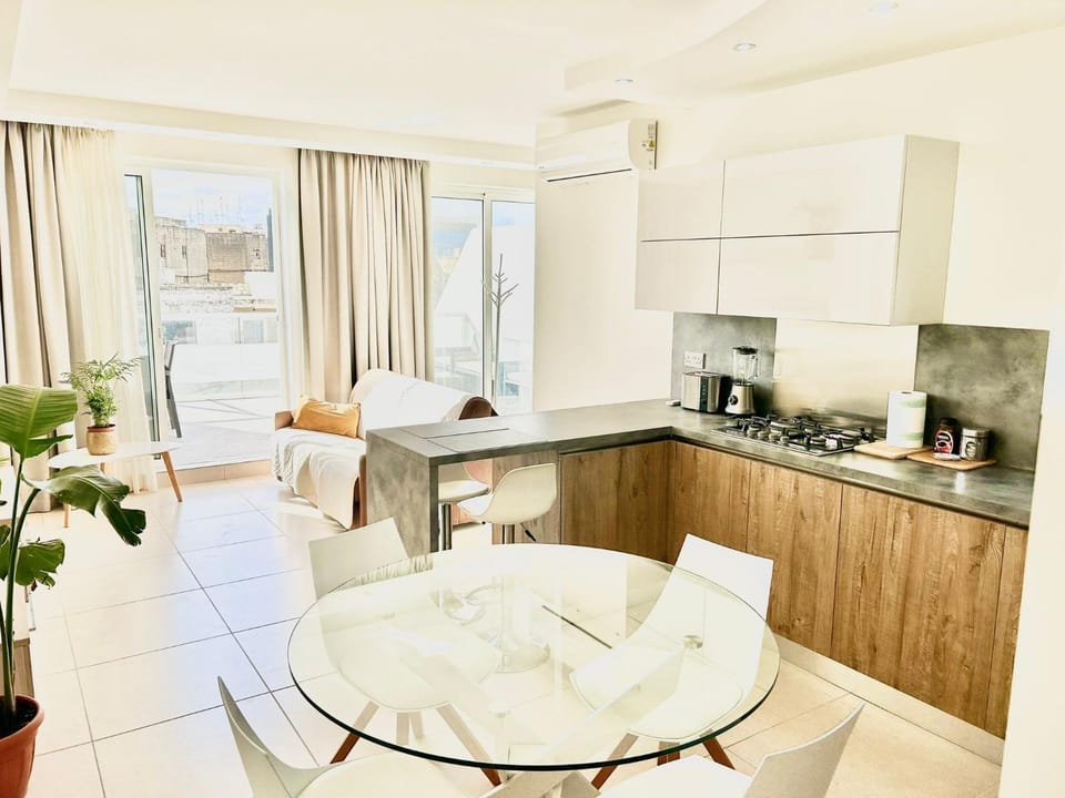 Kitchen or kitchenette, Living room, Seating area, Dining area