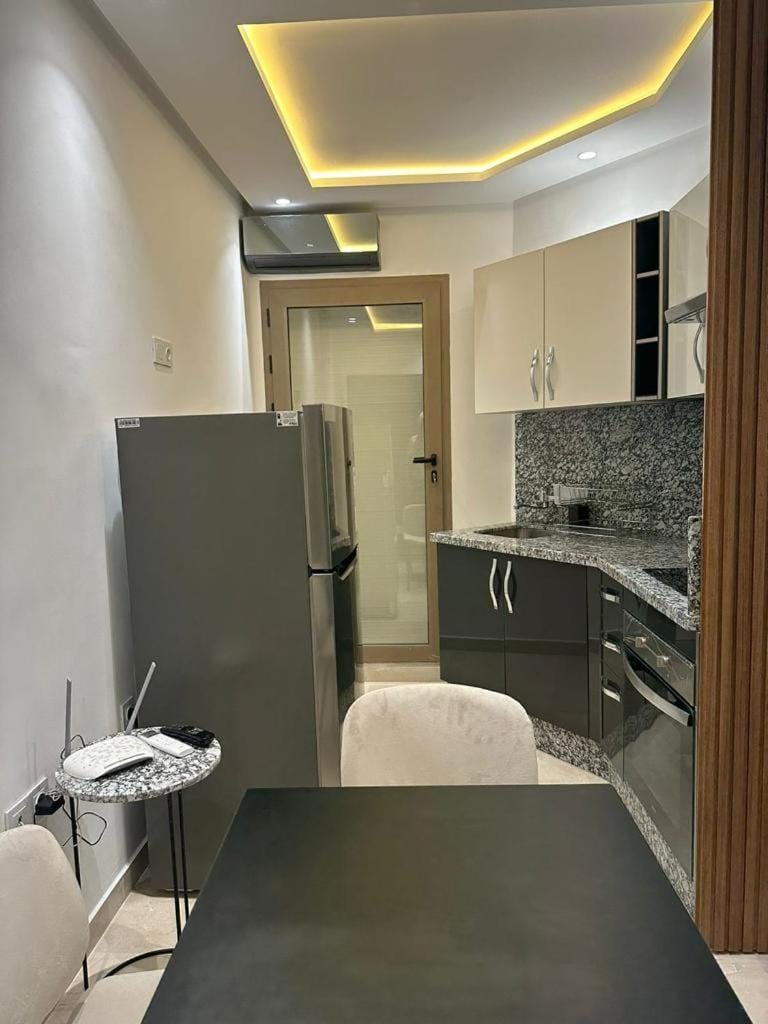 Kitchen or kitchenette, oven