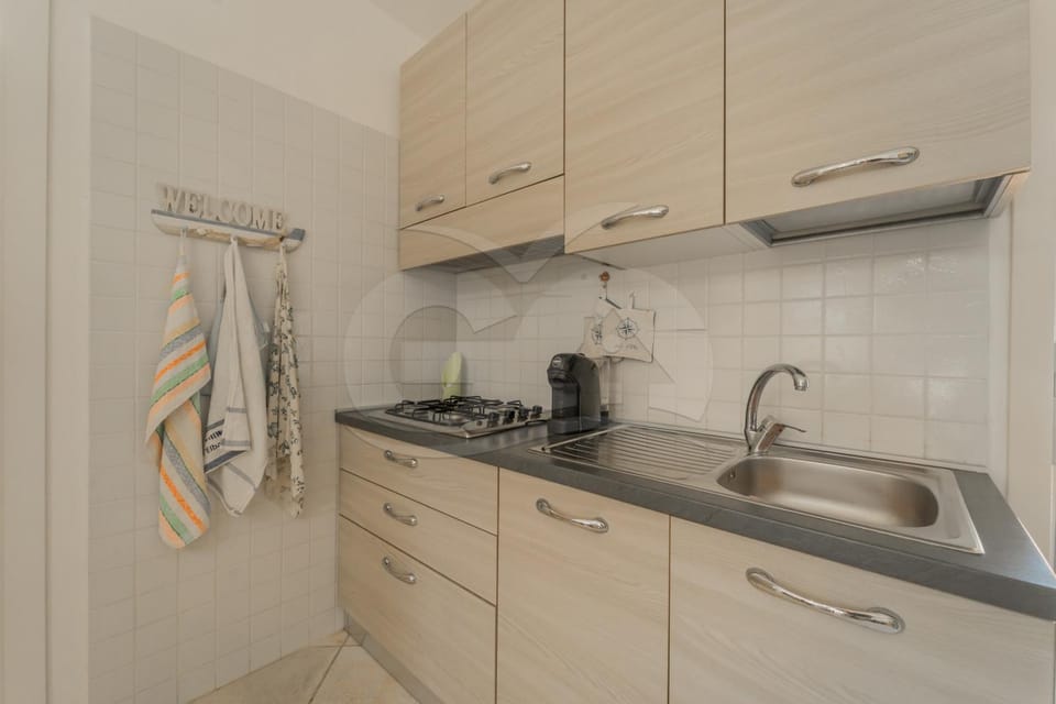 Kitchen or kitchenette, stove