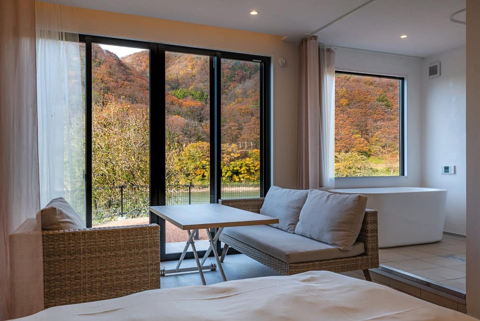 View (from property/room), Living room, Photo of the whole room, Seating area, Autumn, Bath