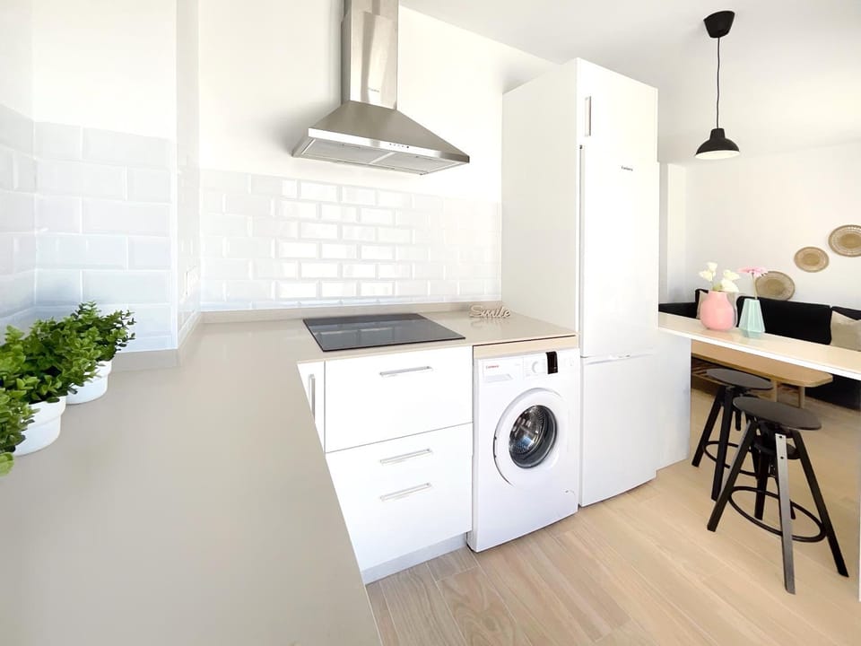 Kitchen or kitchenette, stove, washing machine