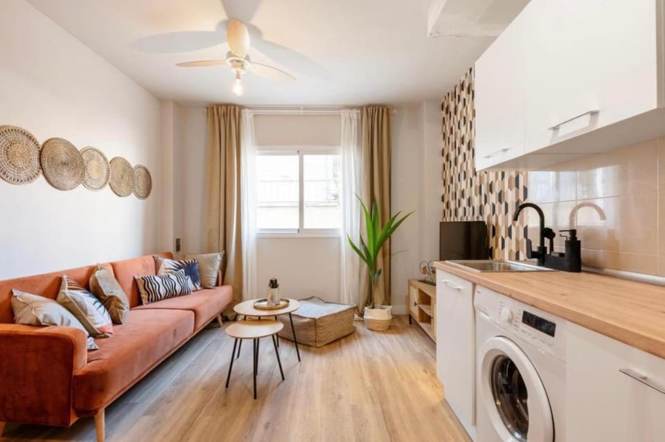 Kitchen or kitchenette, Living room, Seating area, fireplace, washing machine