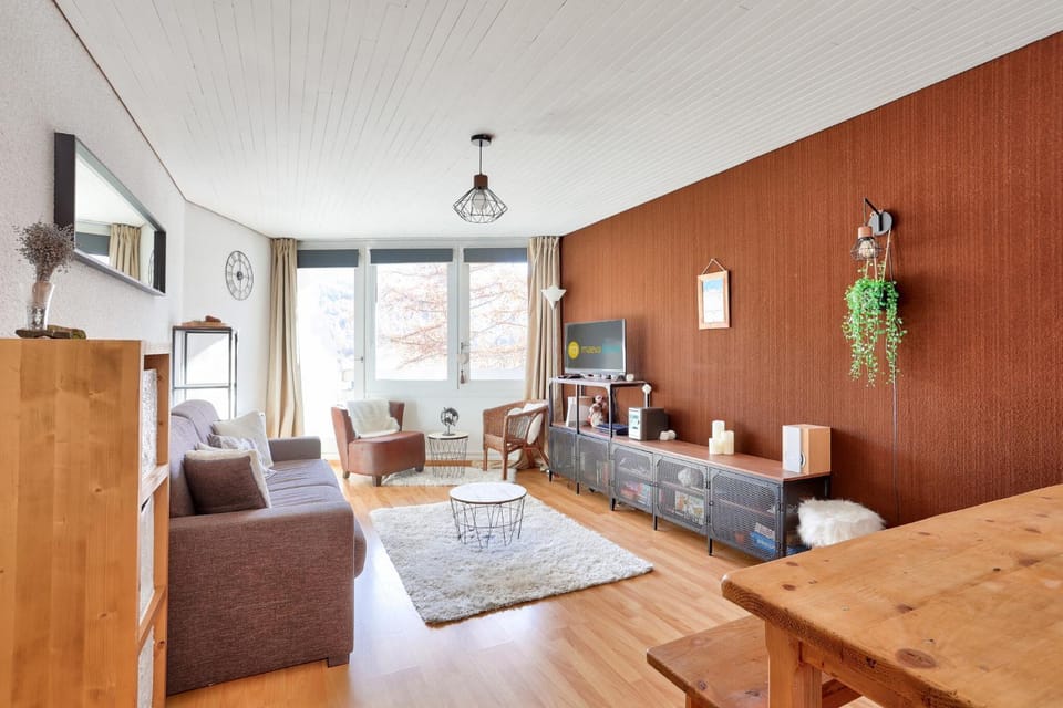 Bed, Living room, fireplace, kitchen