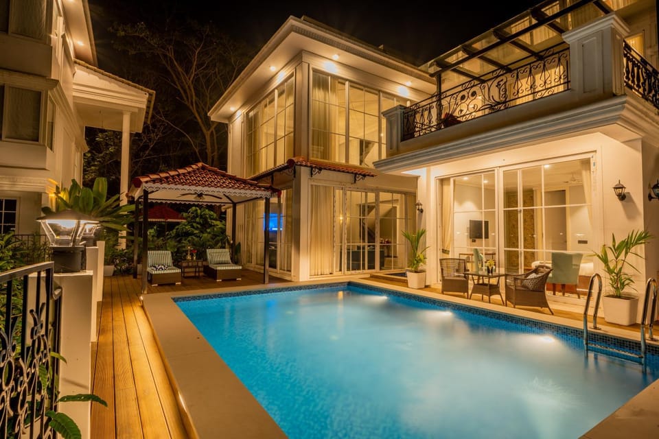 Property building, Patio, Night, Pool view, Swimming pool, sunbed