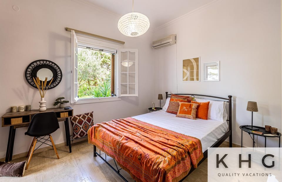 Théa Lassi 2 bedroom apartment, Garden level Apartment in Argostolion