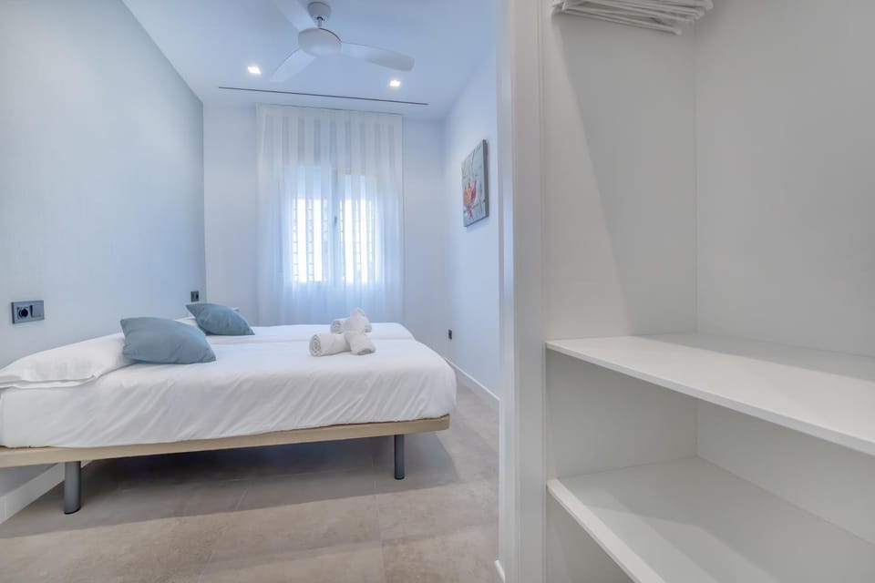 Bed, Bedroom, towels, wardrobe, air conditioner