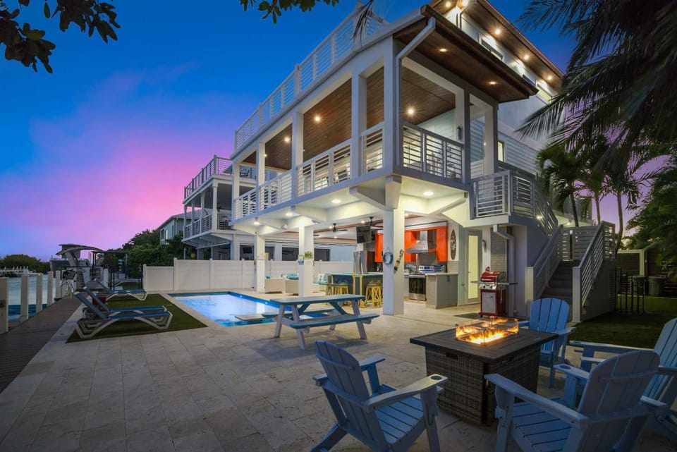 Patio, Night, Pool view, sunbed