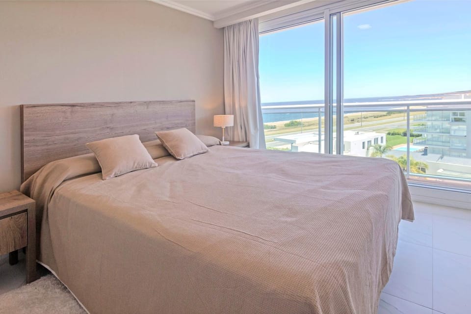 Bed, Natural landscape, Bedroom, Sea view